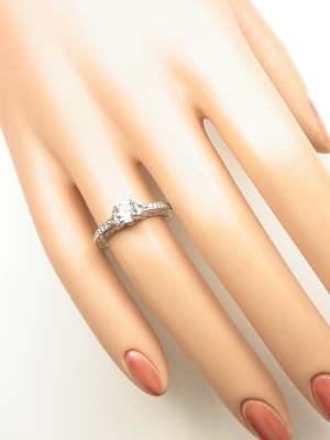 White Sapphire Engagement Ring with Infinity Motif