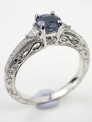 Blue Sapphire Engagement Ring with Infinity Design