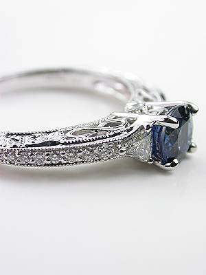 Blue Sapphire Engagement Ring with Infinity Design