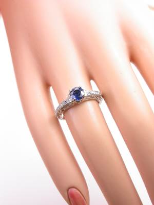 Blue Sapphire Engagement Ring with Infinity Design