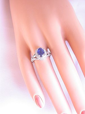 Oval Sapphire Engagement Ring with Diamond Baguettes