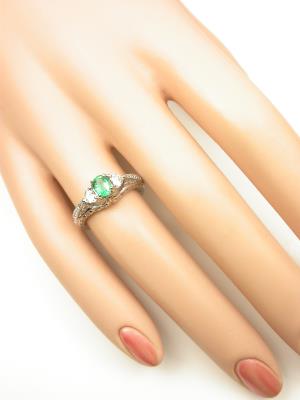 Emerald Engagement Ring with Heart Shaped Diamonds