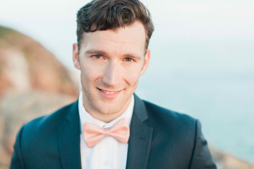 A groom wearing a smashing suit by Stitch And Tie