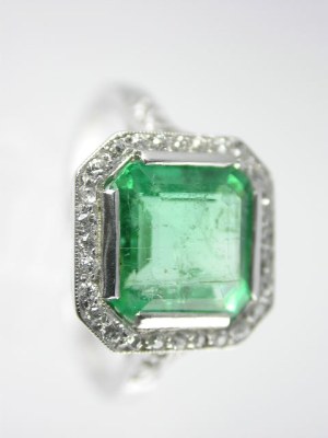 Antique Emerald and Diamond Platinum Engagement Ring