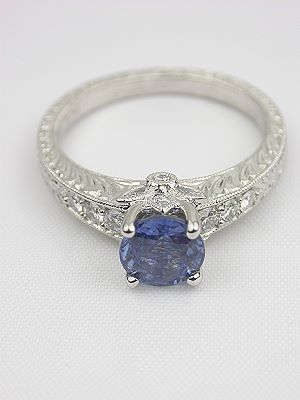 Sapphire Engagement Ring with Flower Motif