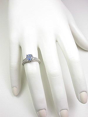 Sapphire Engagement Ring with Flower Motif