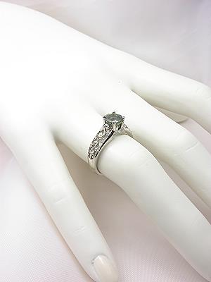 Green Sapphire Engagement Ring with Vine and Leaf Design