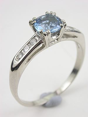 Classic Platinum and Aquamarine Engagement Ring with Airline Design