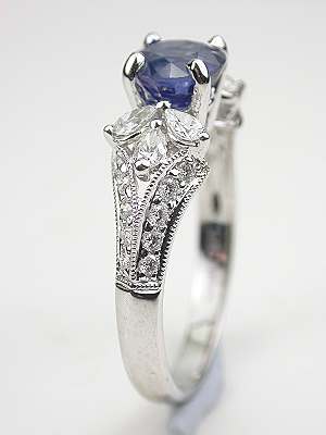 Sapphire Engagement Ring with Pear Shaped Diamonds