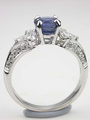 Sapphire Engagement Ring with Pear Shaped Diamonds