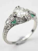 Antique Engagement Ring with Emerald Accents