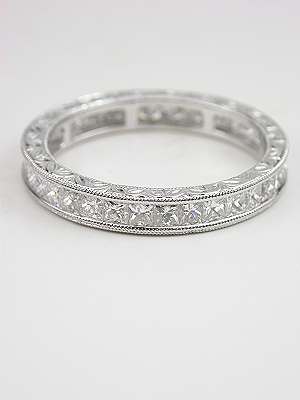 Princess Cut Diamond Eternity Band with Leaf Motif